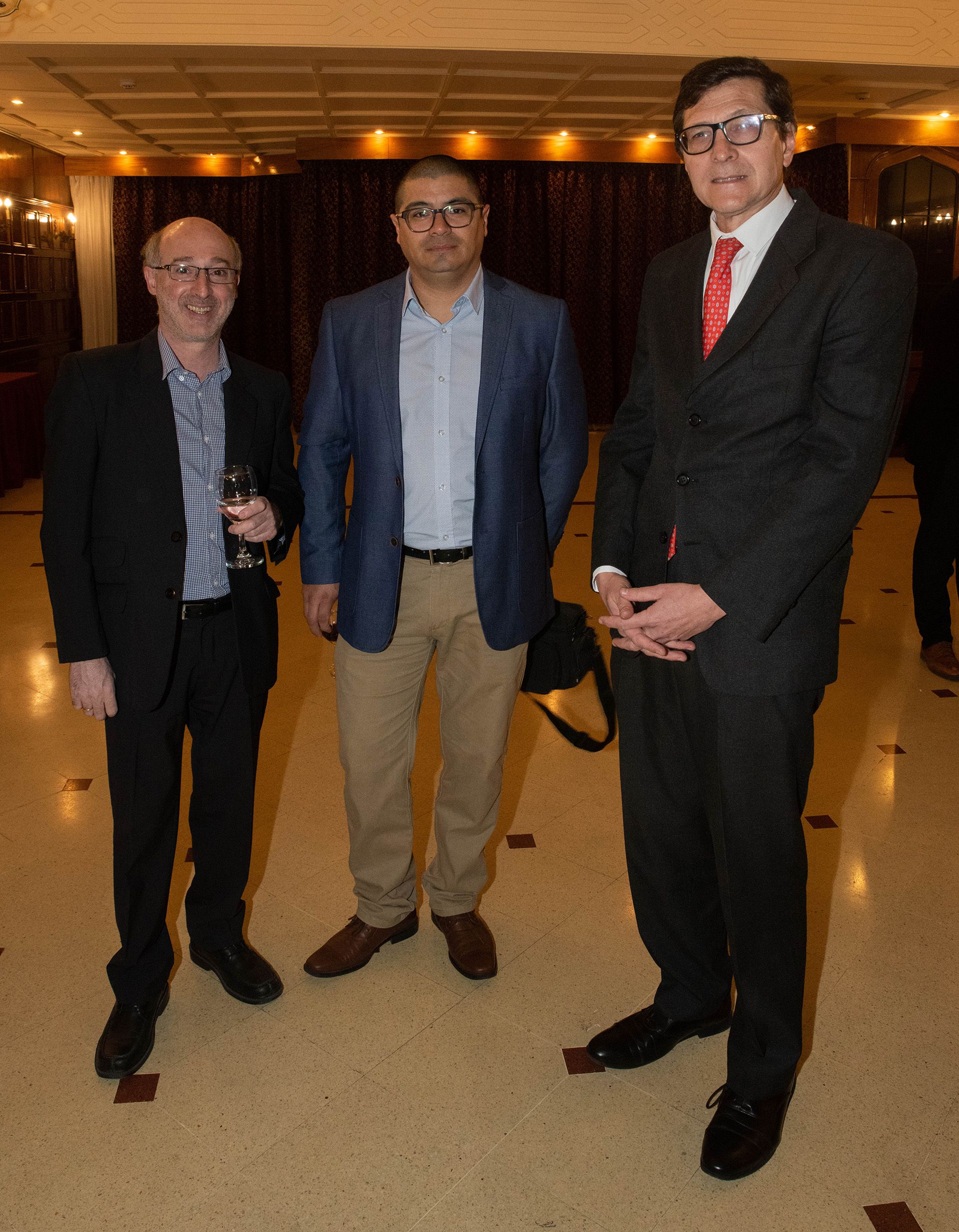 Alejandro Alfie, periodista de Clarín; Francisco Muñoz (Opi Santa Cruz); Fernando Ruiz, profesor de la Universidad Austral