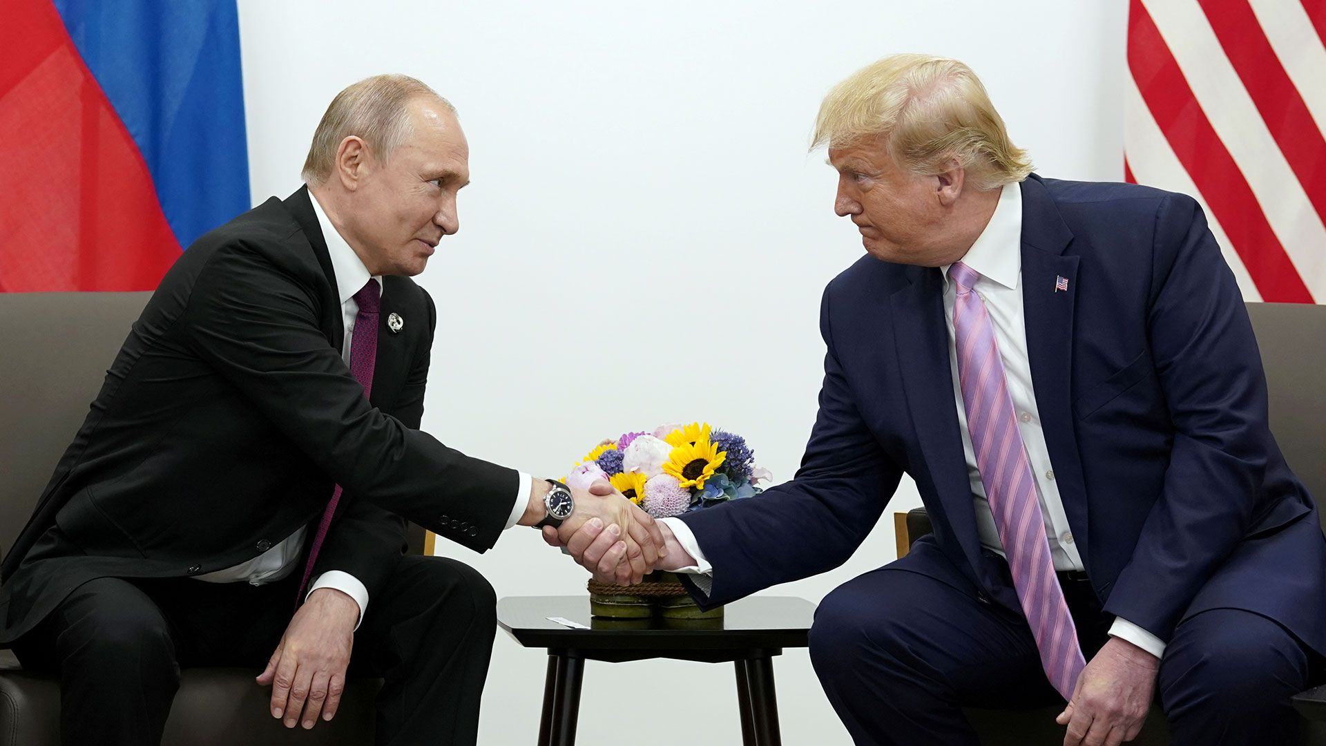 Vladimir Putin junto a Donald Trump (Reuters)