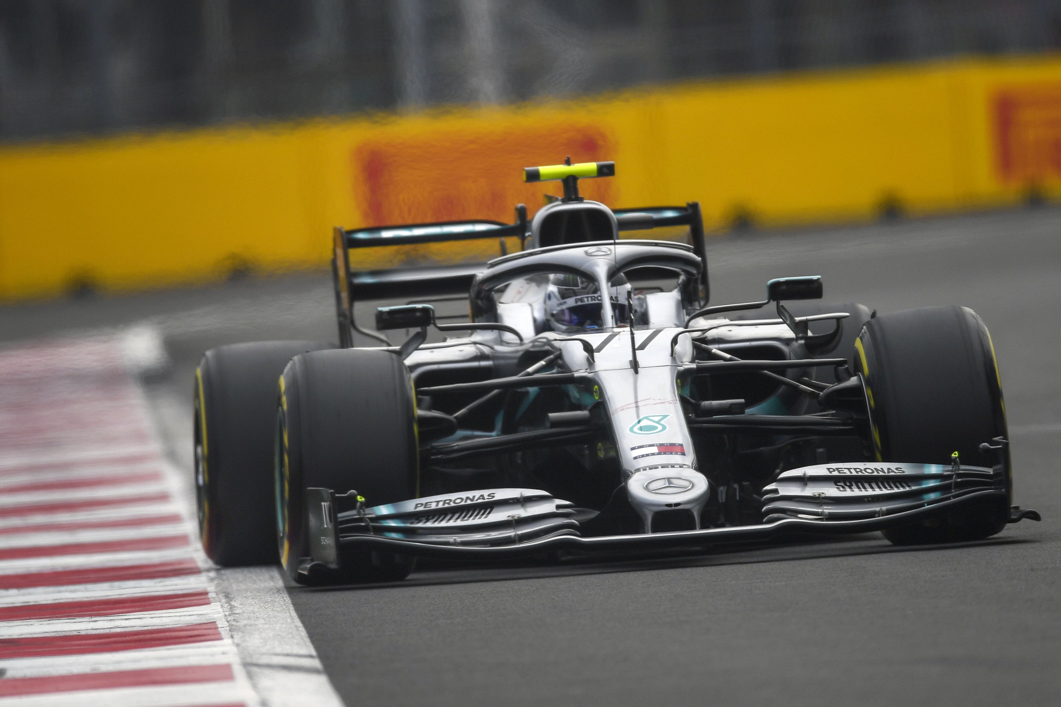 Mercedes Benz's Finnish driver Valtteri Bottas powers his car during the quallifying session of the Mexican Grand Prix at the Hermanos Rodriguez circuit in Mexico City on October 26, 2019. (Photo by PEDRO PARDO / AFP)