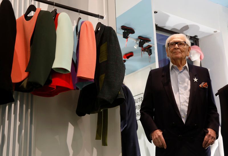 French fashion designer Pierre Cardin, 97, poses during a presentation of a collection made in partnership with Pierre Courtial, a young designer he trained himself at his Studio Pierre Cardin in Paris, France, February 27, 2020. Picture taken February 27, 2020. REUTERS/Charles Platiau