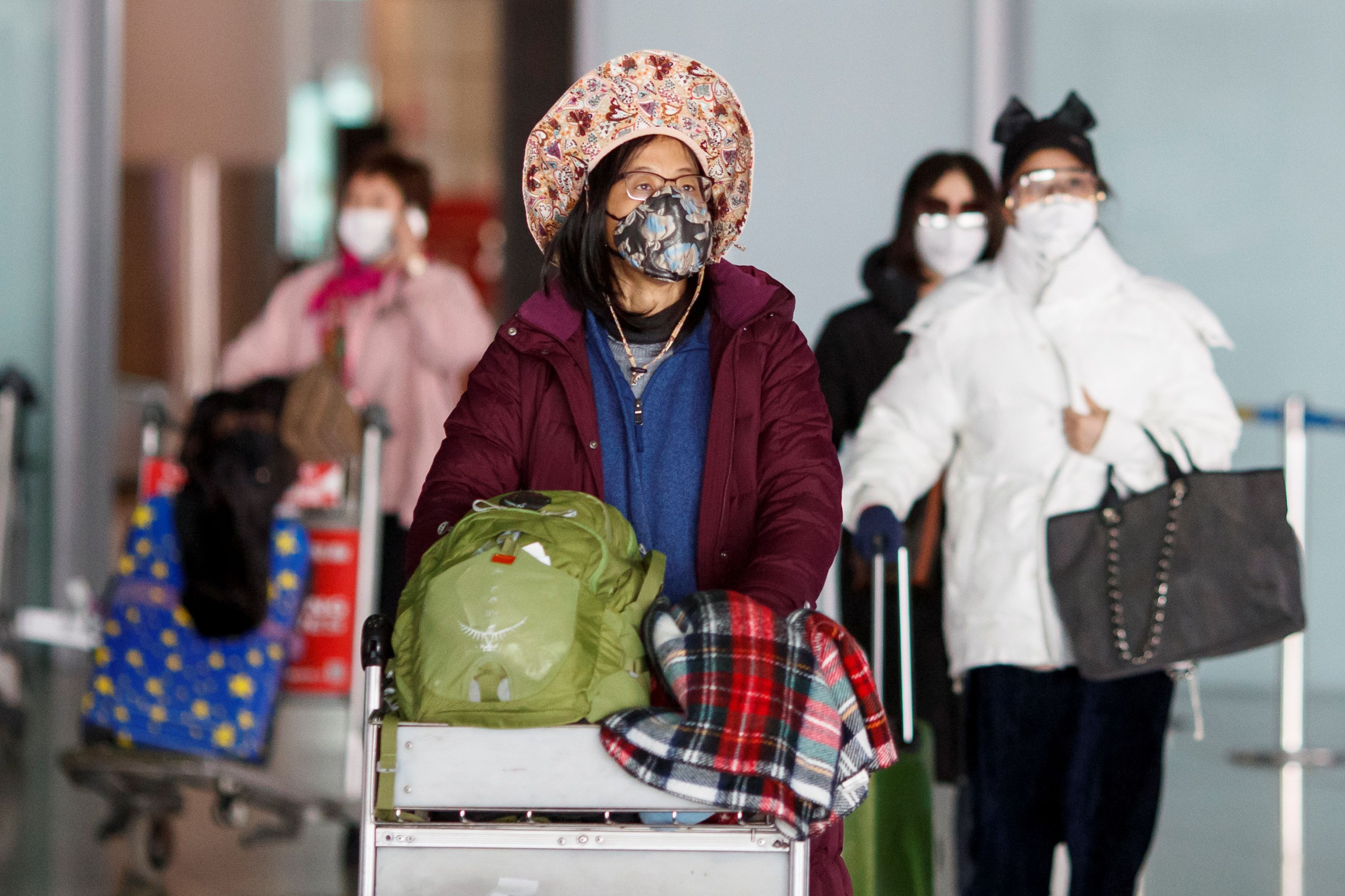 Pasajeros arriban a Beijing (Reuters)