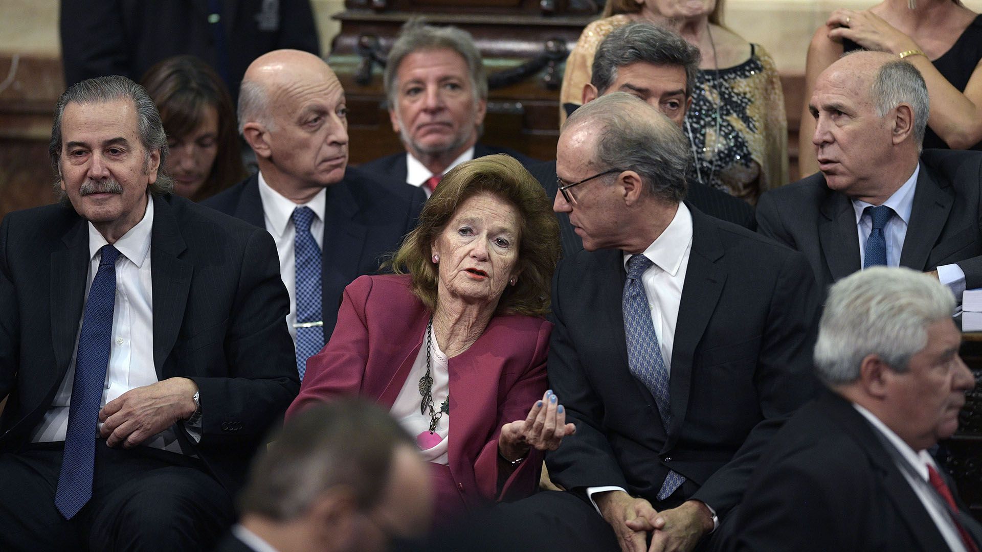 Argentina's Supreme Court members (first row L-R ) judges Juan Carlos Maqueda, Elena Highton de Nolasco and Carlos Rosenkrantz, (back R-L ) judges Ricardo Lorenzetti and Horacio Rosatti (covered), attend the inauguration of the 137th period of ordinary sessions at the Congress in Buenos Aires, Argentina on March 1, 2019. (Photo by JUAN MABROMATA / AFP)