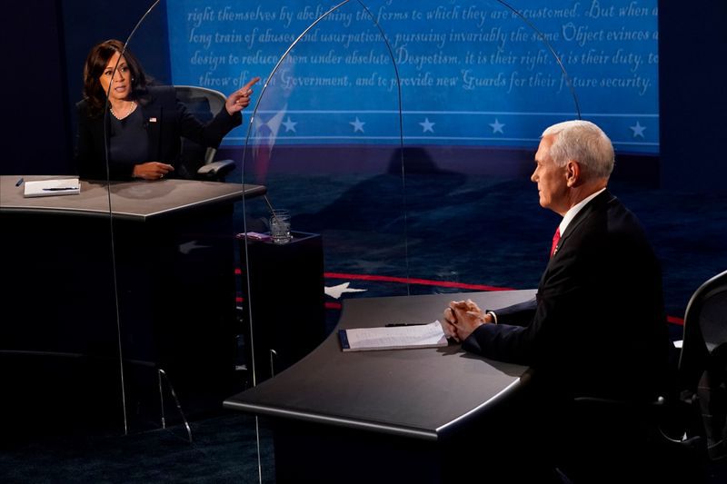 Kamala Harris y Mike Pence, candidatos a vicepresidente demócrata y republicano (Morry Gash/Pool vía REUTERS)