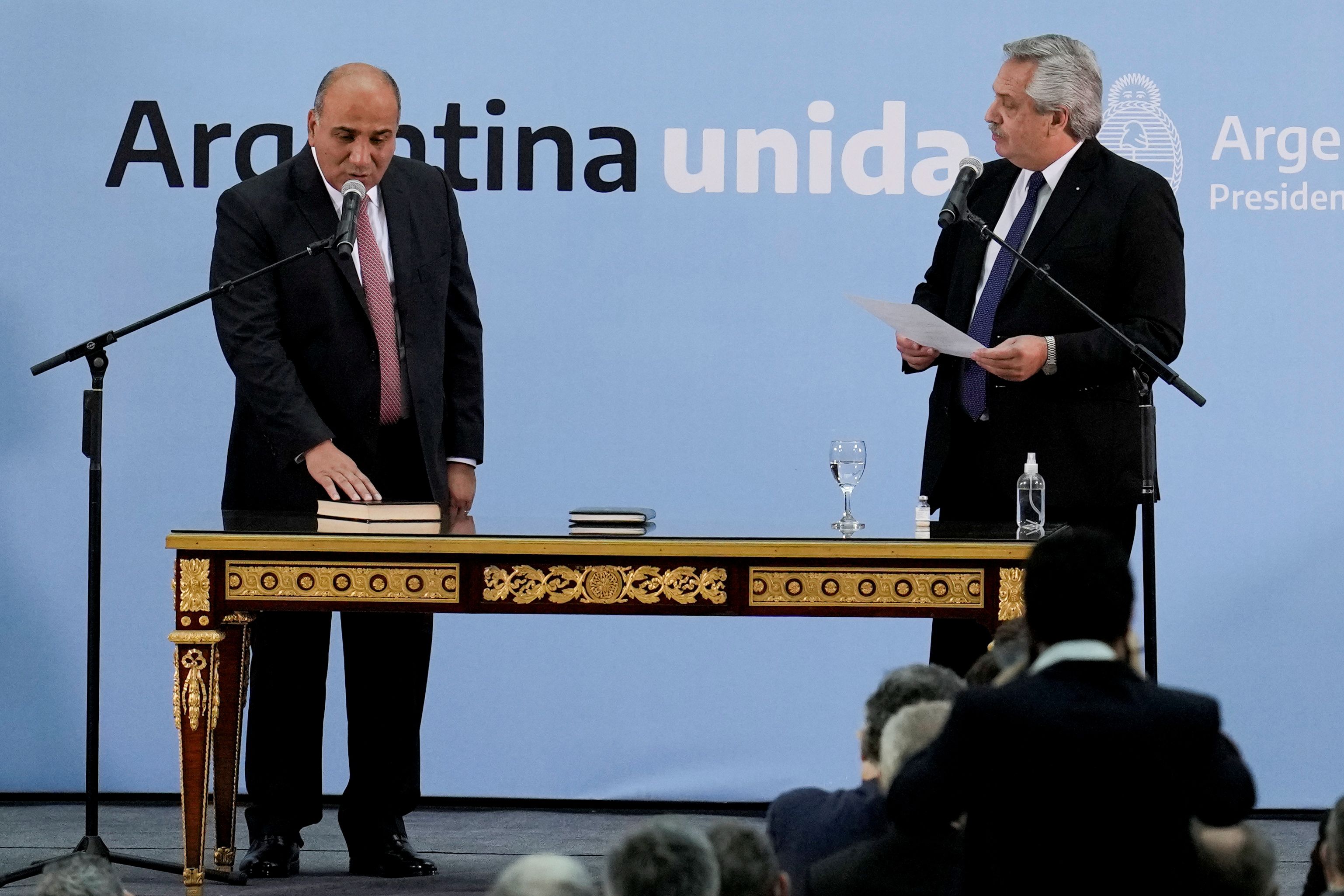 Argentina's President Alberto Fernandez takes the oath to Argentina's chief cabinet Juan Manzur, at the Casa Rosada presidential palace, in Buenos Aires, Argentina September 20, 2021. Natacha Pisarenko/Pool via REUTERS