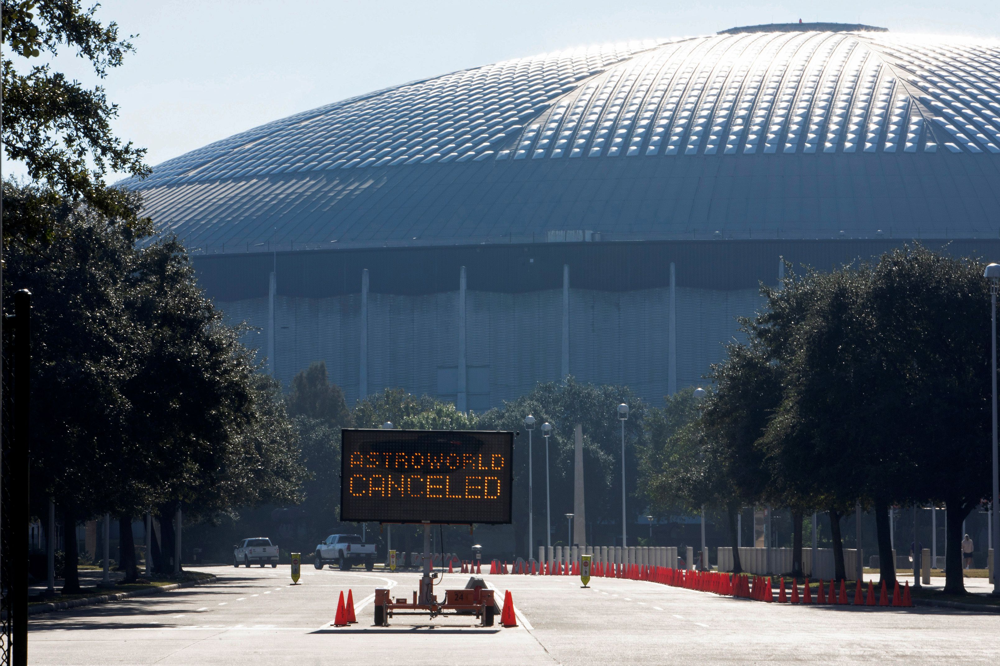 An electronic sign at the entrance to NRG Park states that the Astroworld Festival is cancelled, the morning after a deadly crush of fans during a performance by rapper Travis Scott in Houston, Texas, U.S. November 6, 2021. REUTERS/Daniel Kramer