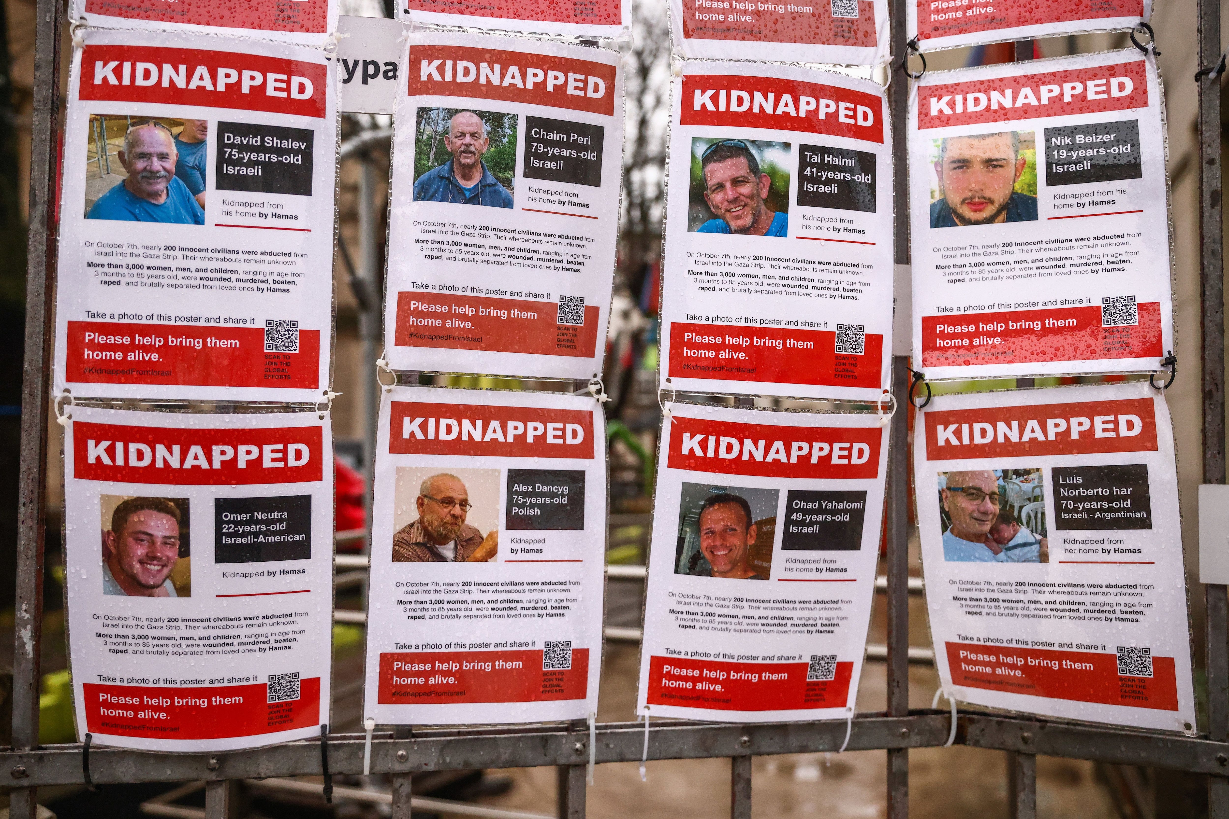 01/01/2024 January 1, 2024, Kraków, Poland: Images of Israeli hostages kidnapped by Hamas are hanging on a gate of Jewish Community Centre in Krakow, Poland on January 1st, 2024. Around 240 people were taken captive by Hamas during the terror attack on Israel on October 7th 2023, with 105 prisoners later being released during a six-day ceasefire at the end of November. POLITICA Europa Press/Contacto/Beata Zawrzel