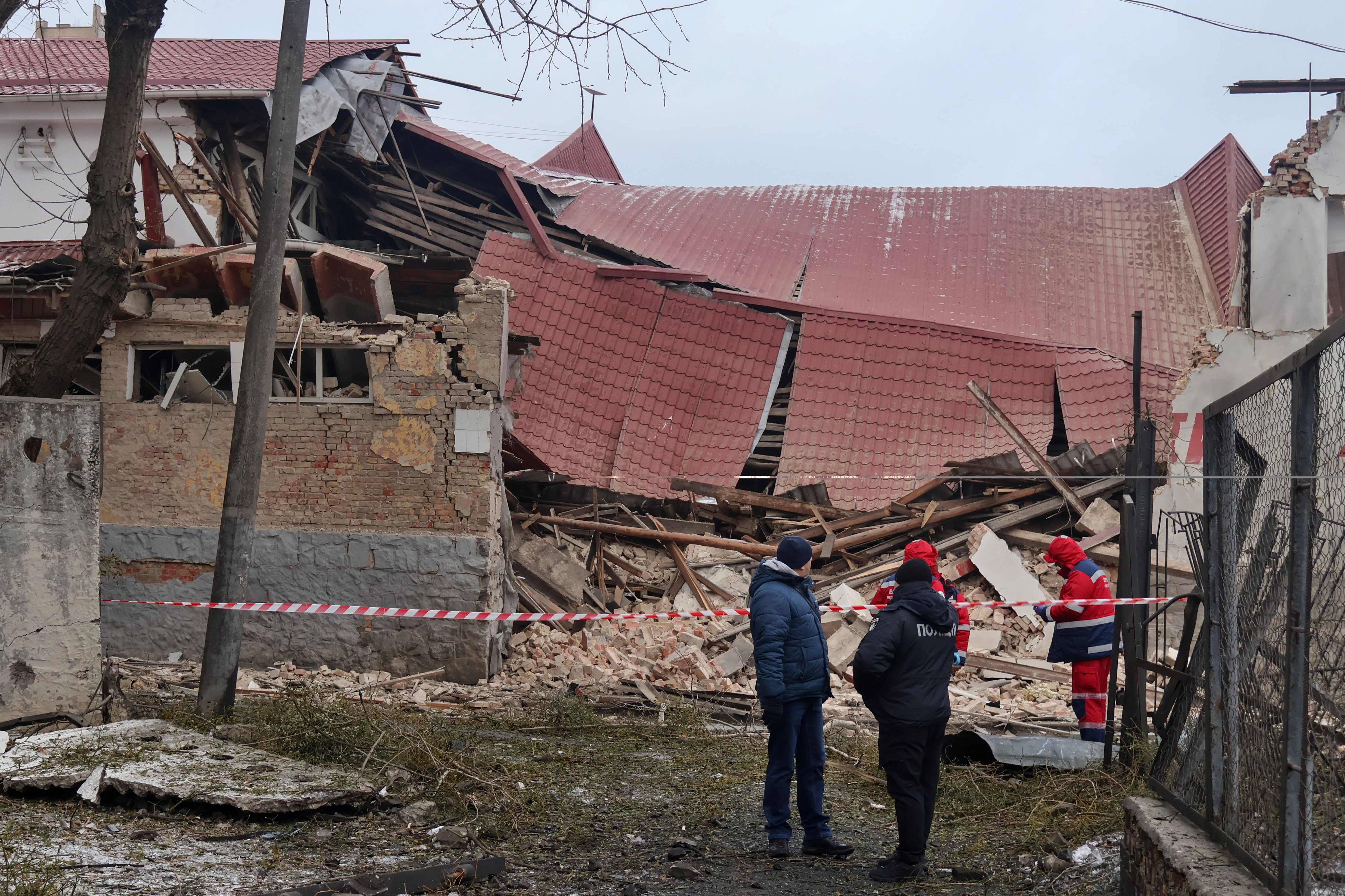 January 23, 2024, Kyiv, Ukraine: Police cordon nearby areas of the damaged buildings after Russian rocket strikes as the Russia-Ukraine war continues in Kyiv. Russian missile attack targeted the Ukrainian cities of Kyiv, Kharkiv, Pavlohrad, and Balakliia, killing at least 4 people, wounding several others, and damaging residential buildings. According to an official, nine people were injured in the capital of Kyiv, while 3 people died and 28 people were injured in the attack in Kharkiv.,Image: 839693229, License: Rights-managed, Restrictions: , Model Release: no, Credit line: Aleksandr Gusev / Zuma Press / ContactoPhoto