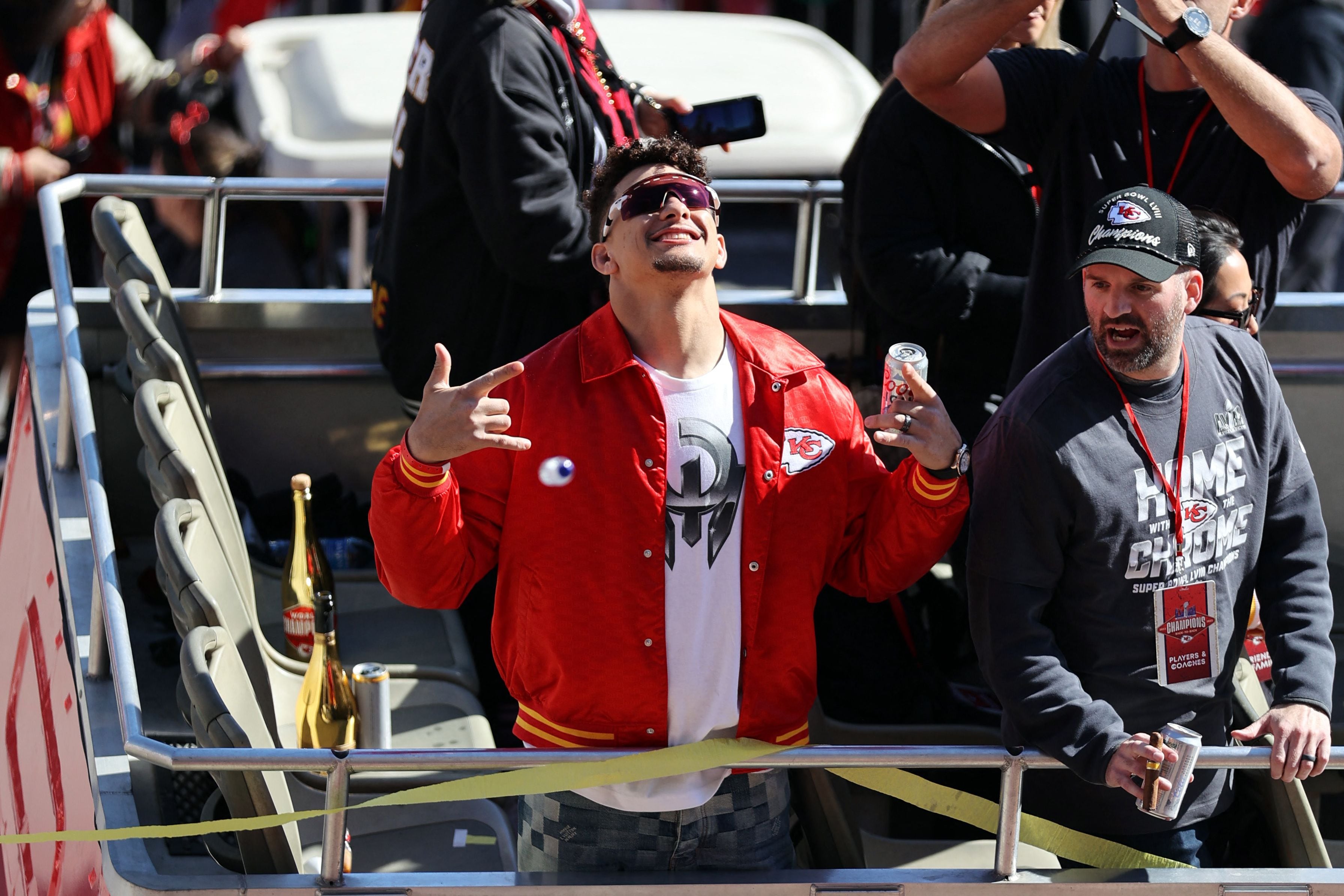 Feb 14, 2024; Kansas City, MO, USA; Kansas City Chiefs quarterback Patrick Mahomes (15) celebrates on the bus in the parade during the celebration of the Kansas City Chiefs winning Super Bowl LVIII. Mandatory Credit: Julia Kapros-USA TODAY Sports