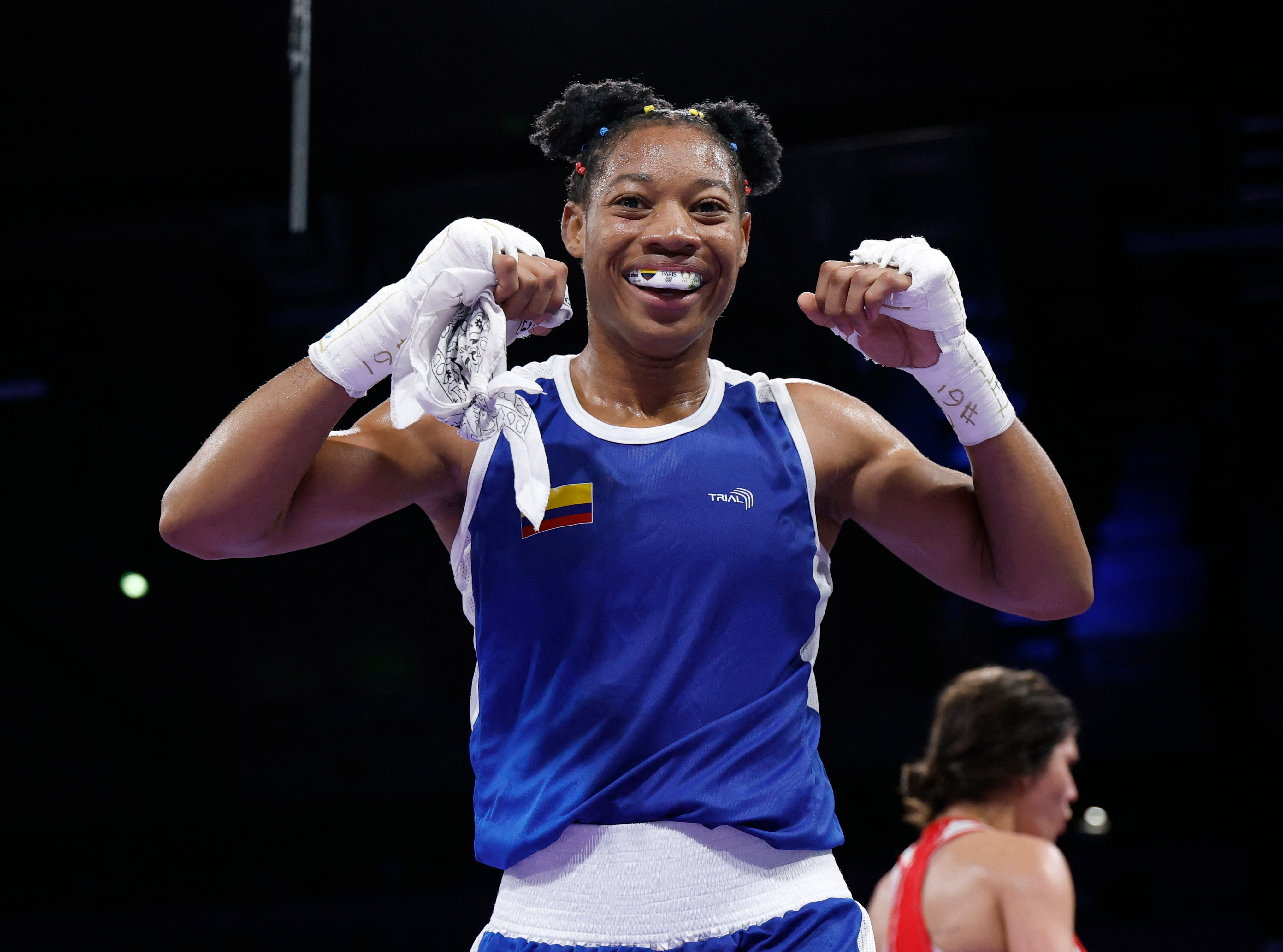 Paris 2024 Olympics - Boxing - Women's 60kg - Prelims - Round of 16 - North Paris Arena, Villepinte, France - July 29, 2024. Angie Paola Valdes Pana of Colombia celebrates winning her fight against Donjeta Sadiku of Kosovo. REUTERS/Peter Cziborra